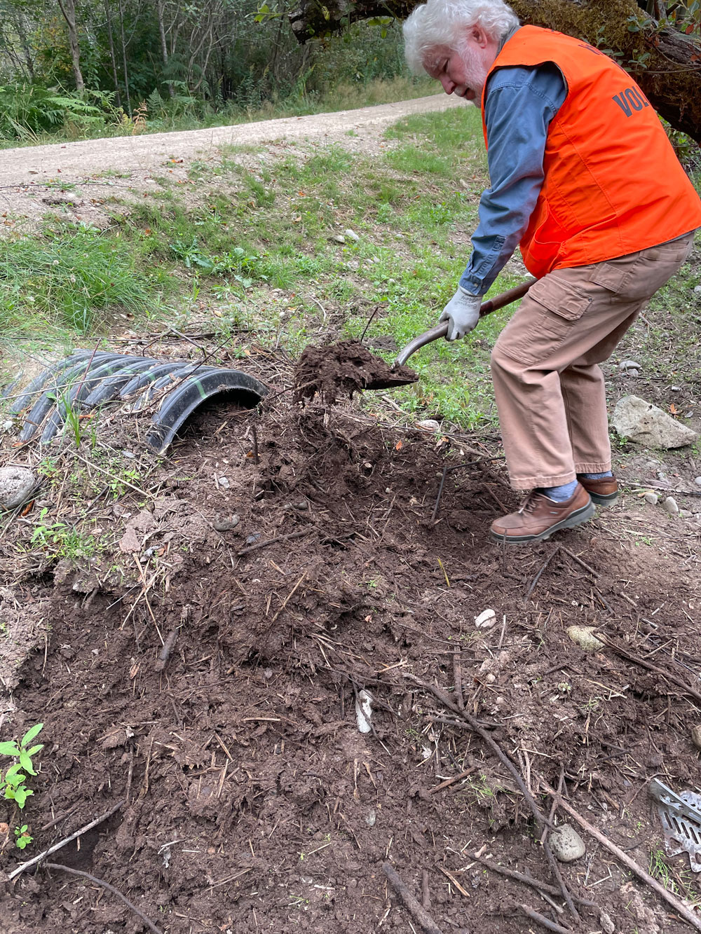 Bill cleaning culvert 5